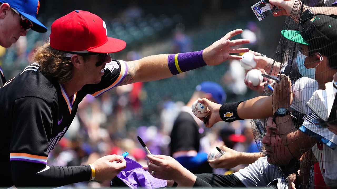 Philadelphia Phillies' Bryson Stott, right, tries to steal second