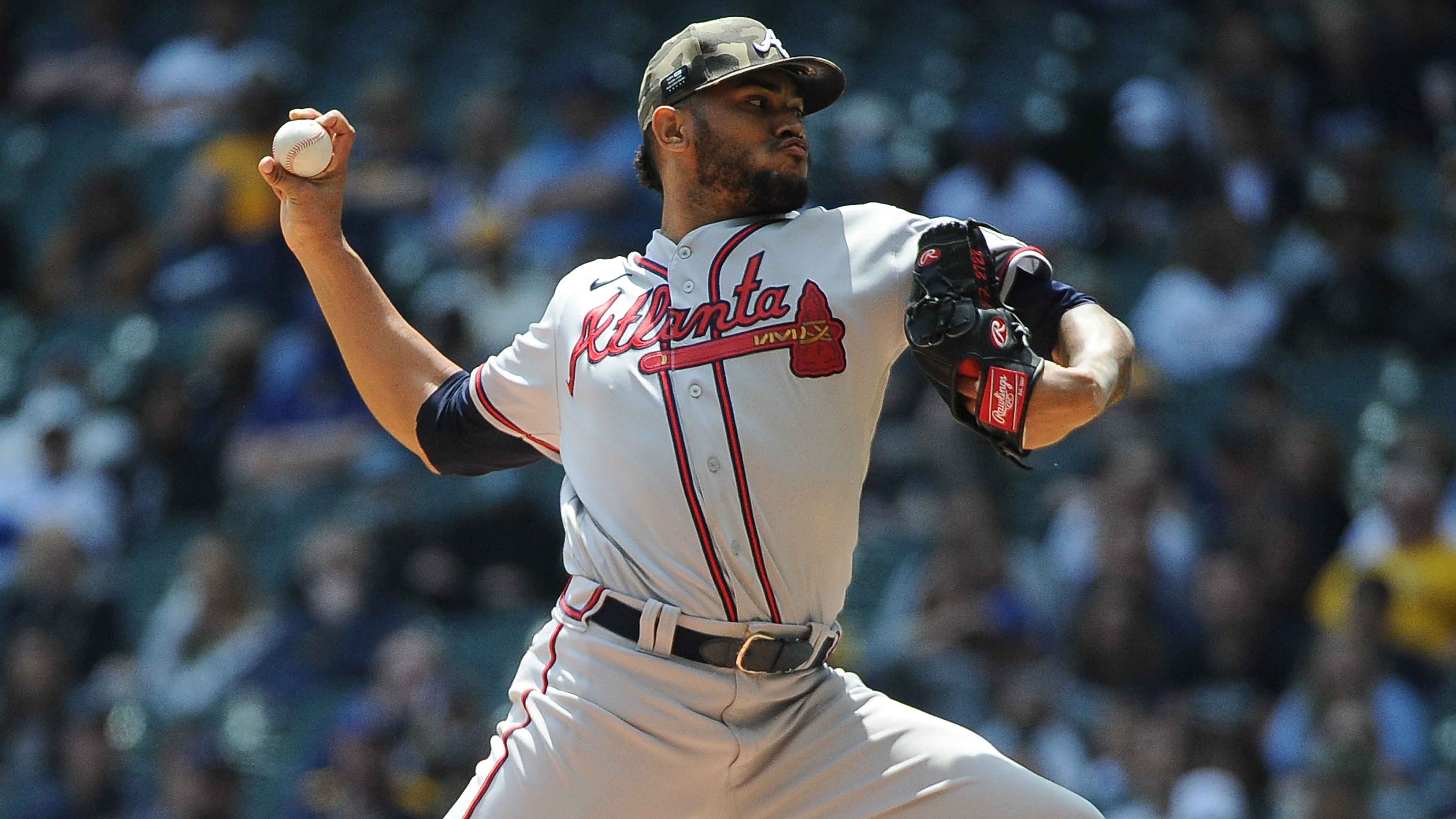 World Team pitcher Michael Ynoa throws a pitch in the fifth inning