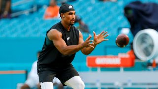 Aug 27, 2022; Miami Gardens, Florida, USA; Philadelphia Eagles quarterback Jalen Hurts (1) catches the football during warmups prior to the game against the Miami Dolphins at Hard Rock Stadium. Mandatory Credit: Sam Navarro-USA TODAY Sports