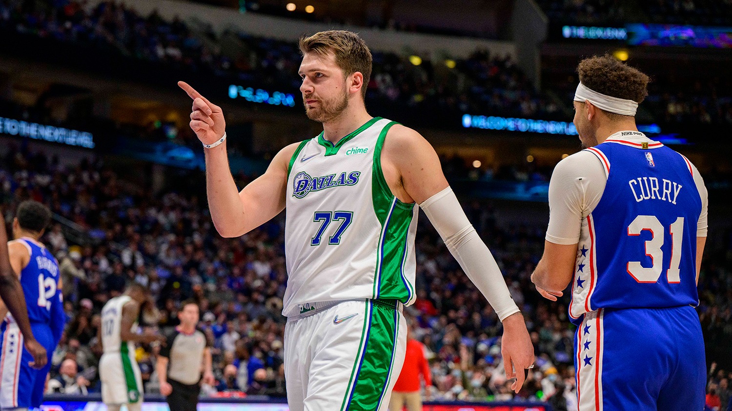 Boban Marjanovic and Luka Doncic of the Dallas Mavericks shake