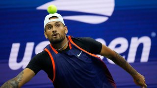 Aug 29, 2022; Flushing, NY, USA; Nick Kyrgios of Australia hits to Thanasi Kokkinakis of Australia on day one of the 2022 U.S. Open tennis tournament at the USTA Billie Jean King National Tennis Center. Mandatory Credit: Robert Deutsch-USA TODAY Sports