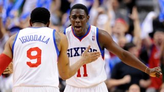 Philadelphia 76ers’ Jrue Holiday (11) celebrates with Andre Iguodala (9) after he scored a 3-pointer against the Chicago Bulls during the second half of Game 4 in a first-round NBA basketball playoff series in Philadelphia, Sunday, May 6, 2012. The 76ers won 89-82. (AP Photo/Michael Perez)