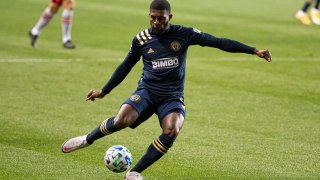 Oct 24, 2020; Philadelphia, Pennsylvania, USA; Philadelphia Union defender Mark McKenzie (4) kicks the ball against the Toronto FC during the first half at Subaru Park. Mandatory Credit: Bill Streicher-USA TODAY Sports