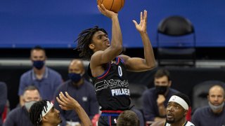 Jan 9, 2021; Philadelphia, Pennsylvania, USA; Philadelphia 76ers guard Tyrese Maxey (0) drives for a score against the Denver Nuggets during the third quarter at Wells Fargo Center. Mandatory Credit: Bill Streicher-USA TODAY Sports