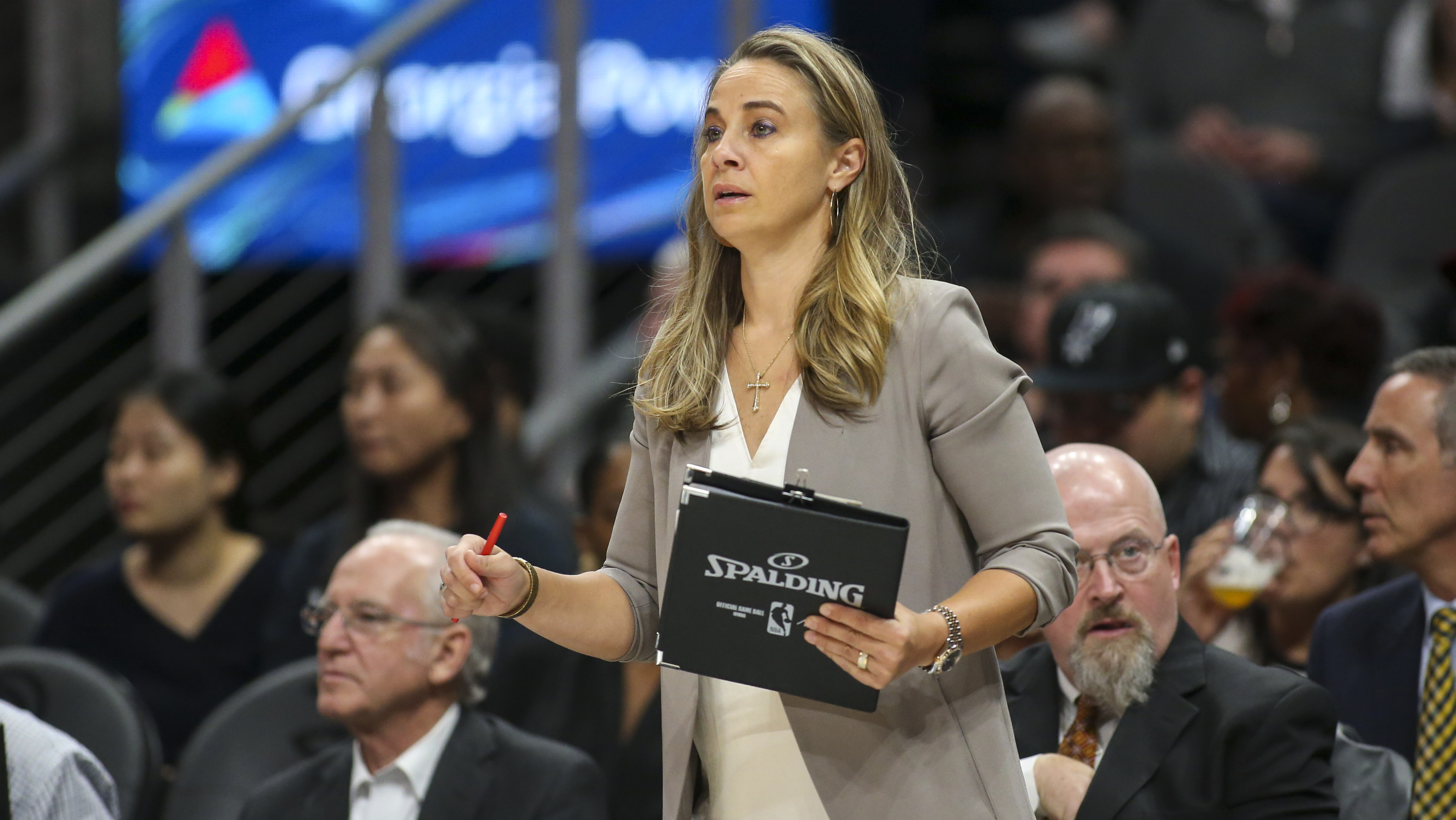 <p>Hammon was a six-time All-Star during her WNBA career before retiring in 2014. Popovich scooped her up right away and she’s been on his staff since. Hammon was the first-ever female head coach in summer league play in 2015, when she led San Antonio to the Las Vegas Summer League title. Popovich also gave her the opportunity to coach the Spurs during a scrimmage against the Bucks in Disney World. Hammon's resume is impressive and it's only a matter of time before an NBA team hires a woman head coach.</p>