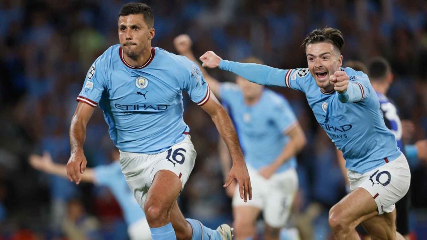 Jack Grealish, right, celebrates after Rodri, left, scores for Manchester City in the Champions League Final.