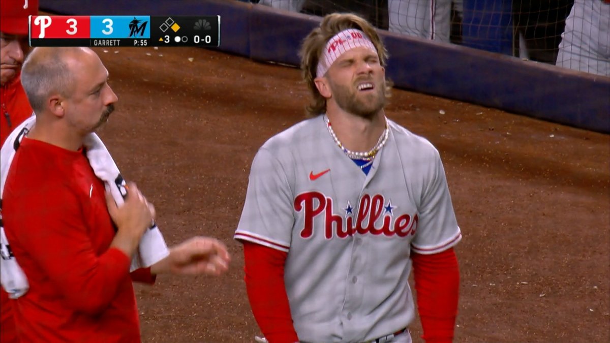 Phillies 'relieved' Bryson Stott OK after taking pitch to elbow; tight back  keeps Bryce Harper at DH