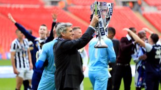 Millwall Chairman John Berylson with the trophy after the 2017 Sky Bet League One play off final at Wembley Stadium, London.