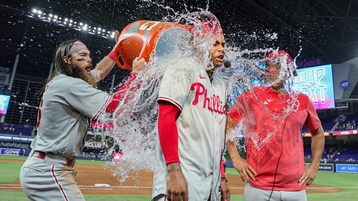 Philadelphia Phillies' Cristian Pache, right, celebrates his RBI