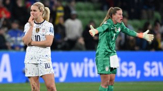 USA’s midfielder Lindsey Horan (L) and USA’s goalkeeper Alyssa Naeher (R) react at the end of the Australia and New Zealand 2023 Women’s World Cup round of 16 football match between Sweden and USA at Melbourne Rectangular Stadium in Melbourne on Aug. 6, 2023.