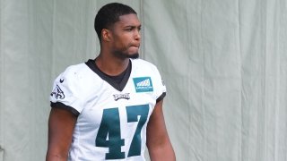 Myles Jack of the Philadelphia Eagles walks onto the field during Training Camp at the NovaCare Complex on Aug. 10, 2023 in Philadelphia, Pa.