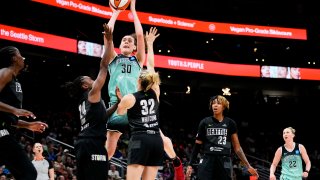 FILE - New York Liberty forward Breanna Stewart (30) shoots against Seattle Storm guards Jewell Loyd (24) and Sami Whitcomb (32) during the second half of a WNBA basketball game, Tuesday, May 30, 2023, in Seattle. finished the regular season second in the league in scoring, averaging a career-best 23 points a game. She helped New York secure the second best record in the league and Tuesday, Sept. 12, became the first player to repeat as The Associated Press WNBA Player of the Year.