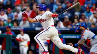 PHILADELPHIA, PENNSYLVANIA – SEPTEMBER 23: J.T. Realmuto #10 of the Philadelphia Phillies hits an RBI single against the New York Mets during the seventh inning of a game at Citizens Bank Park on September 23, 2023 in Philadelphia, Pennsylvania. The Phillies defeated the Mets 7-5. (Photo by Rich Schultz/Getty Images)