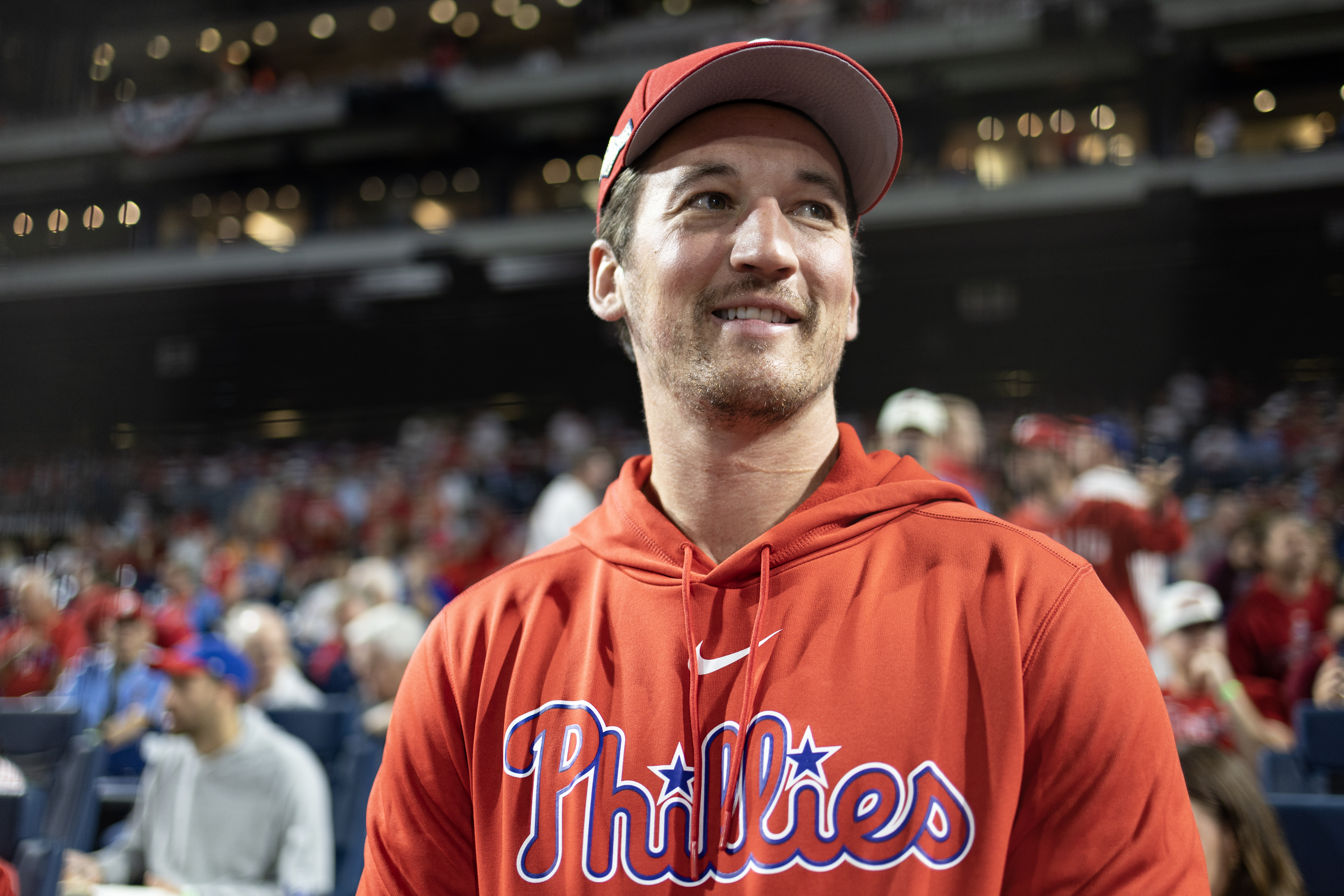 Actor Miles Teller grew up in the Philly suburbs rooting on the Fightins’. He has become a regular at Phillies playoff games in 2022 and 2023.