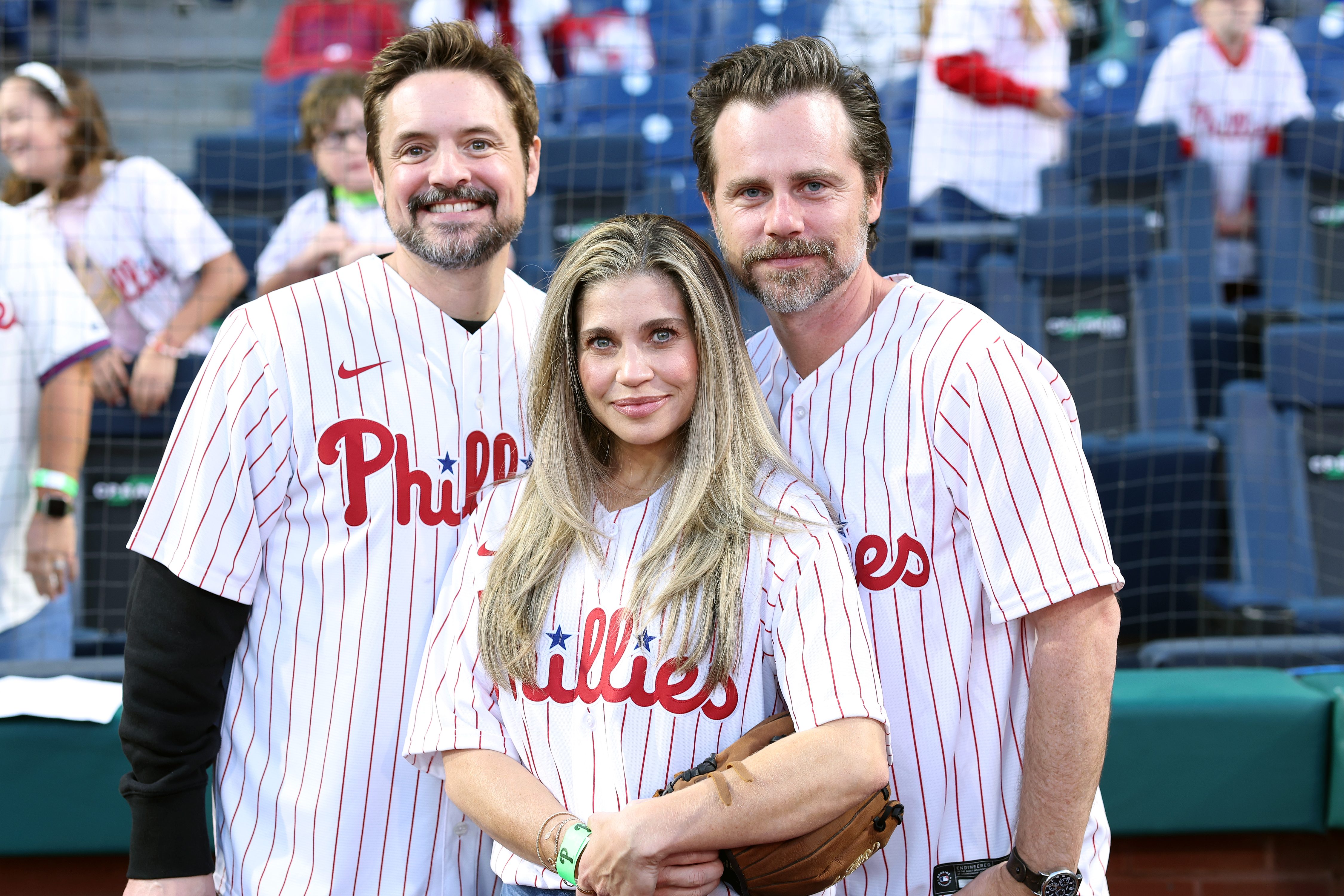 “Boy Meets World” stars Will Friedle, Danielle Fishel and Rider Strong pose for a photo during a game between the Philadelphia Phillies and the Pittsburgh Pirates at Citizens Bank Park on September 27, 2023 in Philadelphia, Pennsylvania.