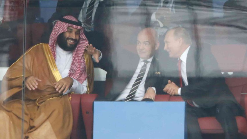 Saudi Arabia Crown Prince Mohammed bin Salman, left, FIFA President Gianni Infantino, center, and Russian President Vladimir Putin watch the match between Russia and Saudi Arabia which opens the 2018 soccer World Cup at the Luzhniki stadium in Moscow, Russia, on June 14, 2018.