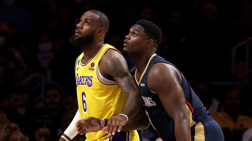 LOS ANGELES, CALIFORNIA – NOVEMBER 02: LeBron James #6 of the Los Angeles Lakers and Zion Williamson #1 of the New Orleans Pelicans watch a free throw during the first half at Crypto.com Arena on November 02, 2022 in Los Angeles, California. NOTE TO USER: User expressly acknowledges and agrees that, by downloading and/or using this Photograph, user is consenting to the terms and conditions of the Getty Images License Agreement. Mandatory Copyright Notice: Copyright 2022 NBAE (Photo by Harry How/Getty Images)