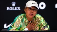 MELBOURNE, AUSTRALIA - JANUARY 15: Naomi Osaka of Japan talks to the media after losing to Caroline Garcia of France in the first round on Day 2 of the 2024 Australian Open at Melbourne Park on January 15, 2024 in Melbourne, Australia (Photo by Robert Prange/Getty Images)