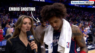 Kelly Oubre Jr. talks Sixers' win with Embiid shooting around in the background