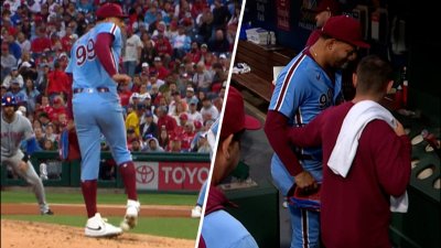 Taijuan Walker exits the game after getting hit by a line drive on his left foot