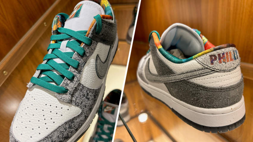 Nike Dunk Low Philly sneakers on display