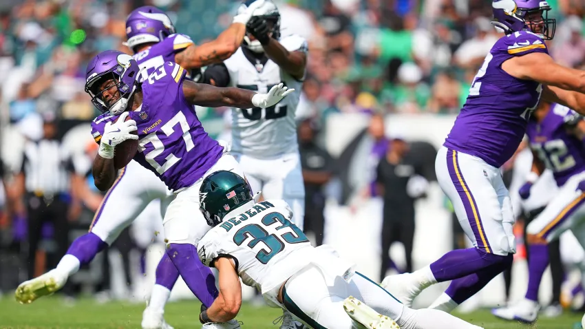 PHILADELPHIA, PENNSYLVANIA – AUGUST 24: Cooper DeJean #33 of the Philadelphia Eagles tackles DeWayne McBride #27 of the Minnesota Vikings in the second half of the preseason game at Lincoln Financial Field on August 24, 2024 in Philadelphia, Pennsylvania. The Vikings defeated the Eagles 26-3. (Photo by Mitchell Leff/Getty Images)