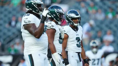 PHILADELPHIA, PENNSYLVANIA – AUGUST 17: Jordan Davis #90, Jalen Carter #98, and Nolan Smith #3 of the Philadelphia Eagles look on against the Cleveland Browns during the preseason game at Lincoln Financial Field on August 17, 2023 in Philadelphia, Pennsylvania. The Browns tied the Eagles 18-18. (Photo by Mitchell Leff/Getty Images)