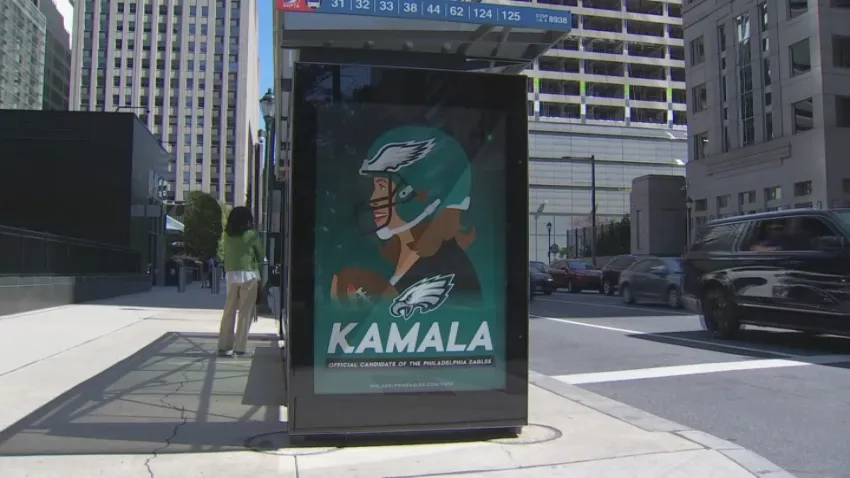 The Philadelphia Eagles say they are working to remove counterfeit ads, like this one at the intersection of 18th Street and JFK Boulevard in Philadelphia.