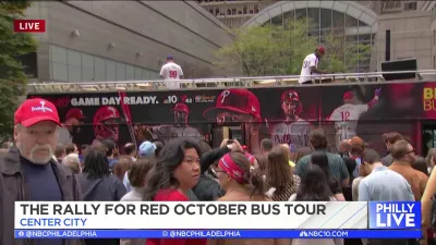 Phillies fans gather in Center City for the Rally for Red October bus tour