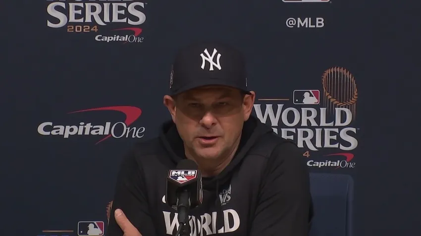 Aaron Boone at desk