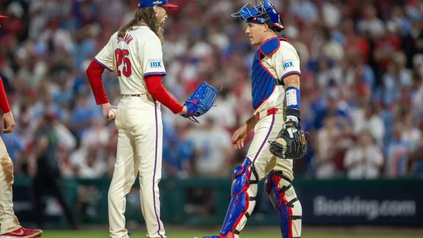 PHILADELPHIA, PA – OCTOBER 06: Philadelphia Phillies catcher J.T. Realmuto (10) speaks with Philadelphia Phillies pitcher Matt Strahm (25) during the National League Division Series game between the New York Mets and the Philadelphia Phillies on October 6th, 2024 at Citizens Bank Park in Philadelphia, PA. (Photo by Terence Lewis/Icon Sportswire via Getty Images)