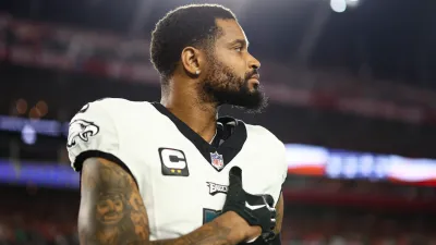 TAMPA, FL – JANUARY 15: Darius Slay #2 of the Philadelphia Eagles stands on the sidelines during the national anthem prior to an NFL wild-card playoff football game against the Tampa Bay Buccaneers at Raymond James Stadium on January 15, 2024 in Tampa, Florida. (Photo by Kevin Sabitus/Getty Images)