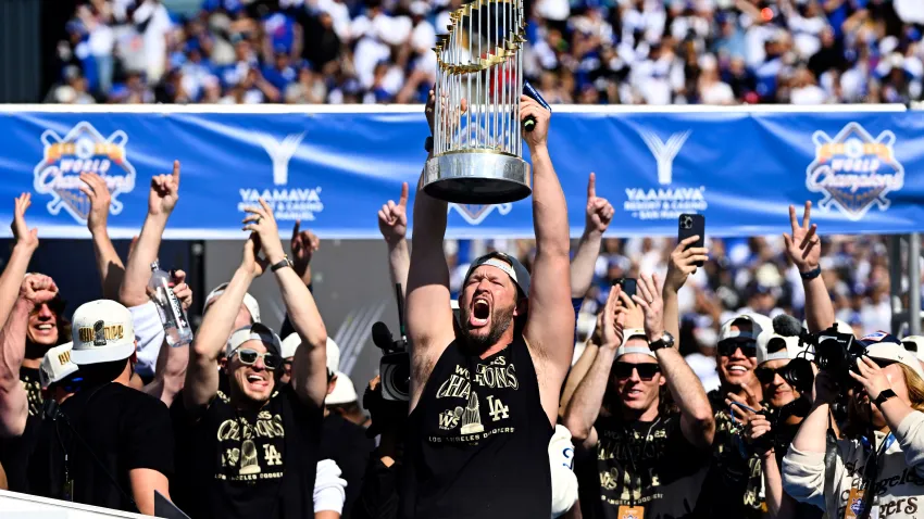 Los Angeles, CA – November 01:  Clayton Kershaw of the Los Angeles Dodgers celebrate as he hoists the championship trophy during a celebration of the 2024 World Series Champion Los Angeles Dodgers at Dodger Stadium in Los Angeles on Friday, November 1, 2024.(Photo by Keith Birmingham/MediaNews Group/Pasadena Star-News via Getty Images)