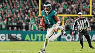 PHILADELPHIA, PA – NOVEMBER 14: Philadelphia Eagles quarterback Jalen Hurts (1) runs the ball during the game between the Philadelphia Eagles and the Washington Commanders on November 14, 2024 at Lincoln Financial Field in Philadelphia, PA. (Photo by Andy Lewis/Icon Sportswire via Getty Images)