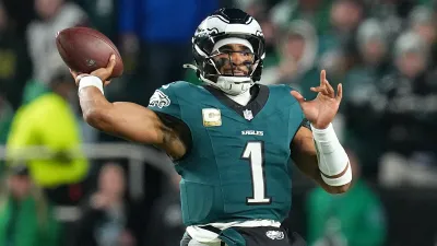 PHILADELPHIA, PENNSYLVANIA – NOVEMBER 14: Jalen Hurts #1 of the Philadelphia Eagles passes the ball against the Washington Commanders during the first quarter at Lincoln Financial Field on November 14, 2024, in Philadelphia, Pennsylvania. (Photo by Mitchell Leff/Getty Images)