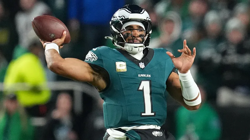 PHILADELPHIA, PENNSYLVANIA – NOVEMBER 14: Jalen Hurts #1 of the Philadelphia Eagles passes the ball against the Washington Commanders during the first quarter at Lincoln Financial Field on November 14, 2024, in Philadelphia, Pennsylvania. (Photo by Mitchell Leff/Getty Images)