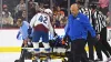 Referee Mitch Dunning stretchered off ice at Flyers vs. Avalanche game