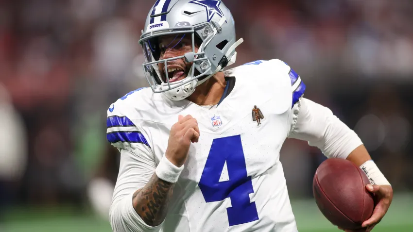 Nov 3, 2024; Atlanta, Georgia, USA; Dallas Cowboys quarterback Dak Prescott (4) runs the ball against the Atlanta Falcons in the second quarter at Mercedes-Benz Stadium. Mandatory Credit: Brett Davis-Imagn Images