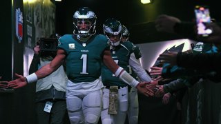 Nov 14, 2024; Philadelphia, Pennsylvania, USA; Philadelphia Eagles quarterback Jalen Hurts (1) walks towards the field for warmups against the Washington Commanders at Lincoln Financial Field. Mandatory Credit: Eric Hartline-Imagn Images