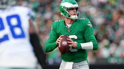 PHILADELPHIA, PENNSYLVANIA – DECEMBER 29: Tanner McKee #16 of the Philadelphia Eagles looks to pass against the Dallas Cowboys during the third quarter at Lincoln Financial Field on December 29, 2024 in Philadelphia, Pennsylvania. (Photo by Mitchell Leff/Getty Images)