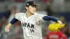 Japanese star pitcher Roki Sasaki says he's signing with the Dodgers