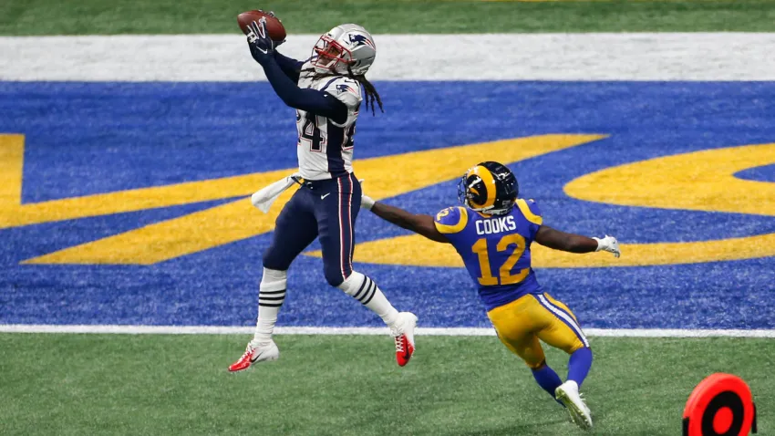 Stephon Gilmore of the New England Patriots intercepts a pass