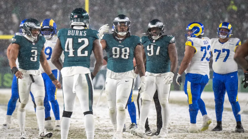 PHILADELPHIA, PA – JANUARY 19: Philadelphia Eagles defensive tackle Jalen Carter (98) and Philadelphia Eagles linebacker Nolan Smith Jr. (3) celebrate a sack during the NFC Divisional Playoff game between the Philadelphia Eagles and the Los Angeles Rams on January 19th, 2025 at Lincoln Financial Field in Philadelphia, PA. (Photo by Terence Lewis/Icon Sportswire via Getty Images)