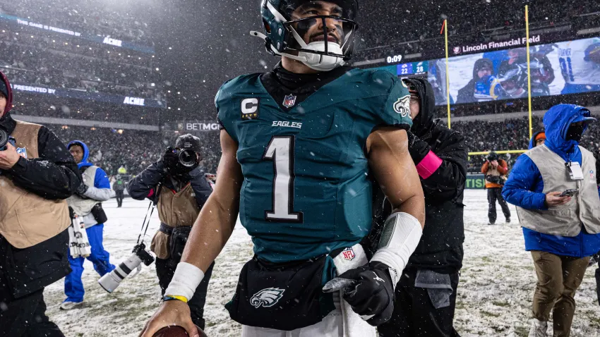 Jan 19, 2025; Philadelphia, Pennsylvania, USA; Philadelphia Eagles quarterback Jalen Hurts (1) walks the field after a victory against the Los Angeles Rams in a 2025 NFC divisional round game at Lincoln Financial Field. Mandatory Credit: Bill Streicher-Imagn Images