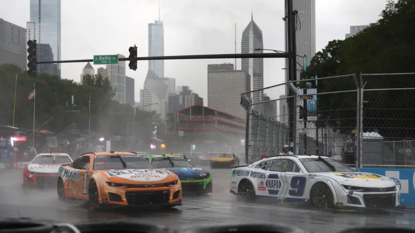 Car racing the streets of Chicago.