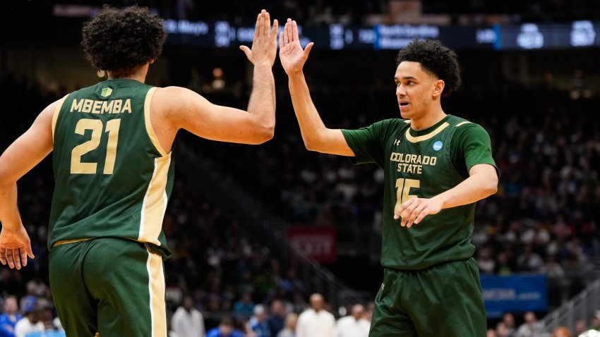 Colorado State Rams guard Jalen Lake celebrates with forward Rashaan Mbemba