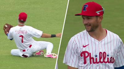 Trea Turner makes a smooth sliding catch to rob a base hit