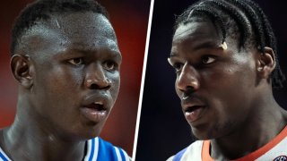Khaman Maluach #9 of the Duke Blue Devils and Rueben Chinyelu #9 of the Florida Gators.