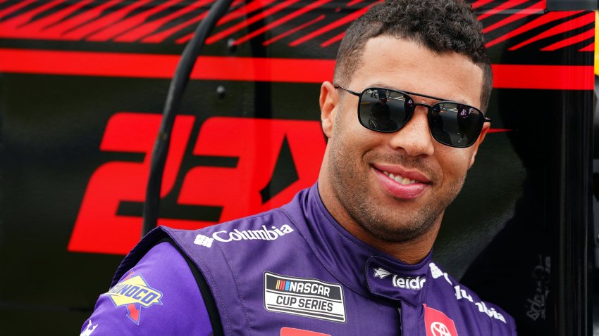 NASCAR Cup Series driver Bubba Wallace (23) waits on pit road during qualifying for the Geico 500 at Talladega Superspeedway.