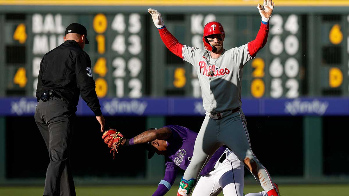 Bats jump all over Rockies, Luzardo finds second wind in Phillies&#39; 5th straight win
